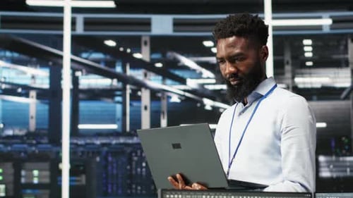 Portrait of Data Center Engineer Analyzing Gear Issues Using Node Tree Tool