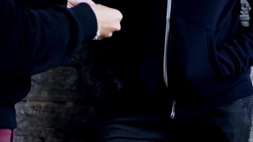 Addict buys dose from dealer on street in shadowy drug trafficking trade