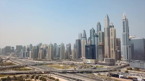 Dubai marina skyline at daytime. Drone aerial cinematic shot. 4K.