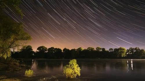Star Trails On Night Sky Background Timelapse Night Sky Above River Star Lines Move In Sky Amazing