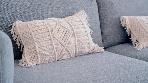 Elegant Sofa with Textured Pillows in Modern Living Room