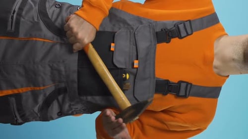 Vertical Video Body of Repairman in Industrial Work Clothes Fix Concept Renewal Service