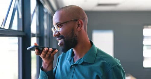 Phone, voice recognition and businessman in office by window for mobile communication