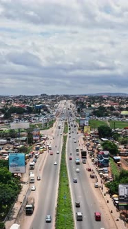 Drone Shot of Moving Traffic on a Highway In Accra