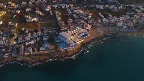 Aerial View of Stalida Crete at Sunset with Coastal and Town Details