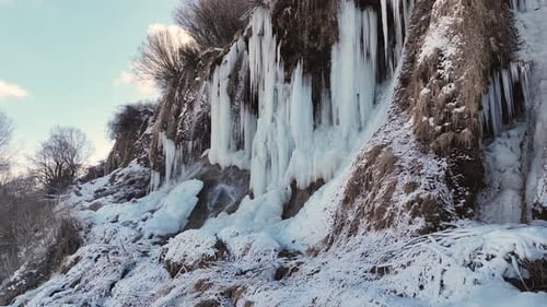 Frozen Waterfall with Striking Icicles in Winter