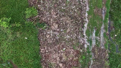 Aerial Rubbish View Over Outdoor Rural Field With Litter