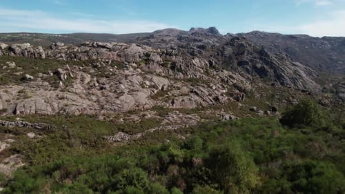 Flying Over Stunning Mountain Rocks