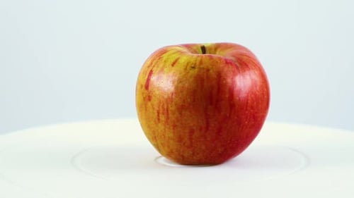 Shiny Apple Rotating in Close Up Shot