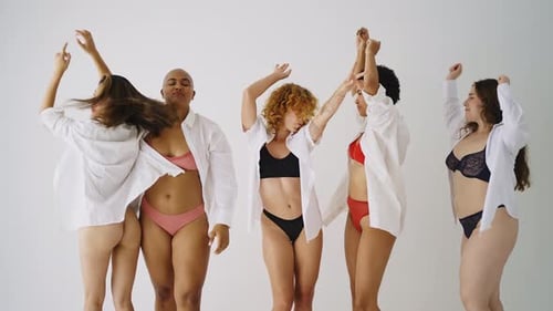 Group of Diverse Young Women Dancing Confidently