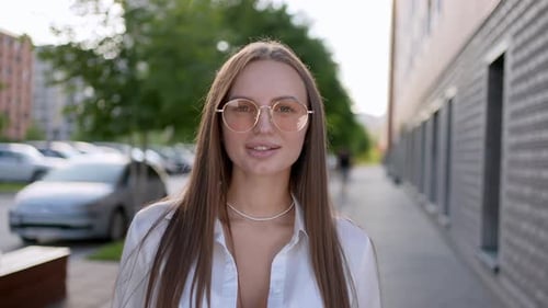 Beautiful Happy Smiling Young Woman Portrait Girl Looking to Camera in City Streets Summer