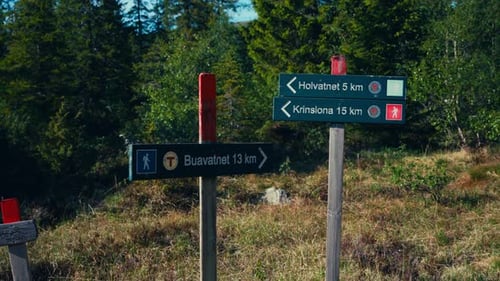 Sign Post Along Hiking Path In Skurven, Indre Fosen, Norway. panning shot