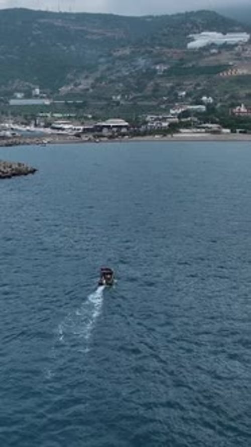 Vertical Video Mediterranean Angling Sunrise Journey on a Small Boat