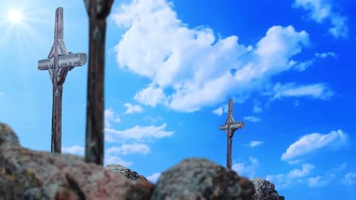 Wooden Crosses on Hilltop Against Blue Sky