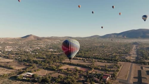 Drone Shot Of Teotihuacan City of Gods, Aztec Pyramids, Hot Air Balloons In Background, Mexico