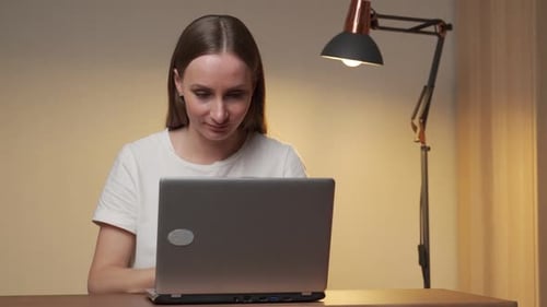 Business Woman Holding the Bridge of Her Nose Suffering From Dry Eye Syndrome After Long Use of a