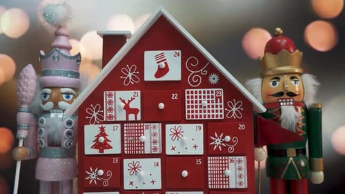 Wooden Tree Advent Calendar Decorated and Nutcracker Soldier Toys With Bokeh Blured BackgrWooden Tre