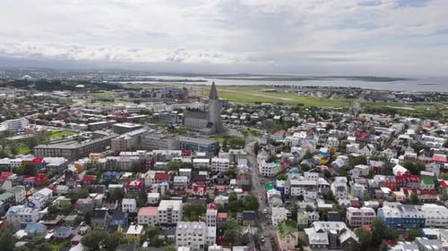 Aerial View of Downtown Reykjavik, Iceland. Church and Buildings, Establishing Drone Shot