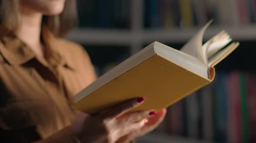 Closeup Unrecognizable Smart Girl Student Reading Book Near Bookshelf in University Library Young