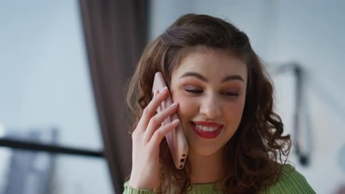 Stylish Woman Talking on Phone Indoors