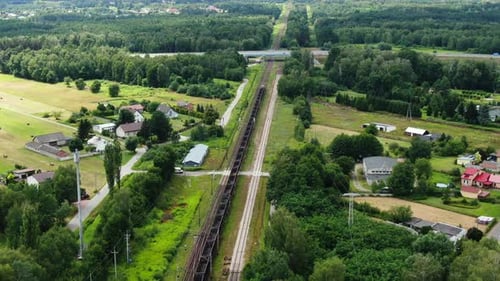 Railway cargo train wagon rides on railroad. Transportation and delivery of cargo in containers. Aer