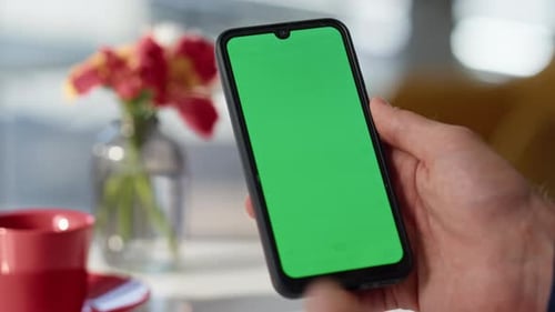 Guy Finger Tapping Greenscreen Smartphone Online at Coffee Shop Table Closeup