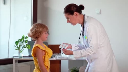 Child Vaccination in Pediatrician Hospital Medical Clinic Office Doctor Injection with Syringe Nurse