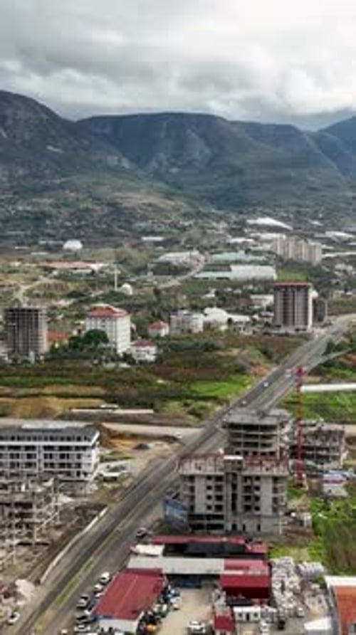 Vertical Video Coastal Tempest Aerial Perspective of Stormy Mediterranean Coastline and City