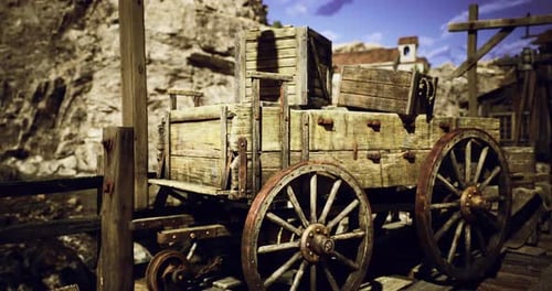 Old Wooden Cart Parked at a Rustic Dock Surrounded By Rocky Hills