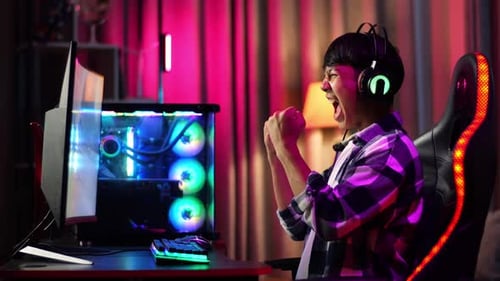 Excited Young Gamer Wins While Streaming Online