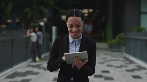 Happy Business Woman Goes Home After Work and Does Online Shopping Browsing a Store Young Female