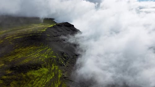 Flying Through Clouds Above Hills Cowered With Green Grass Paradise Heaven Mountain Range With High