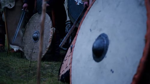 Soldiers Beat Shields with Swords and Axes