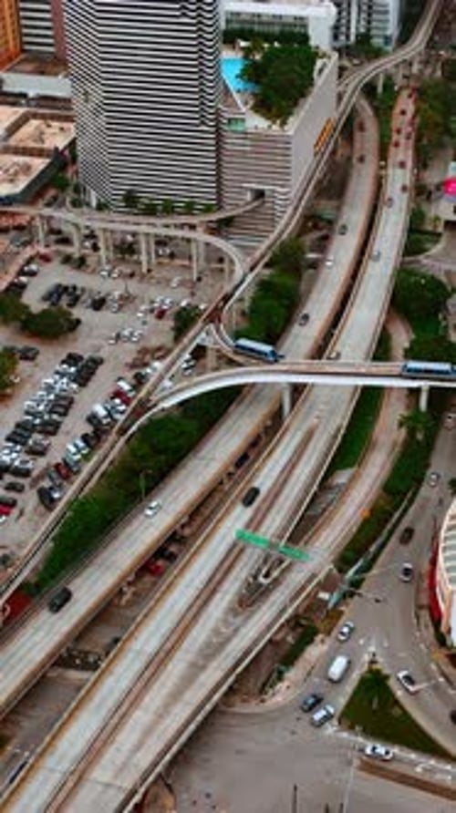 Drone footage approaching the roads and tram rail in the district of Miami, Florida, USA.