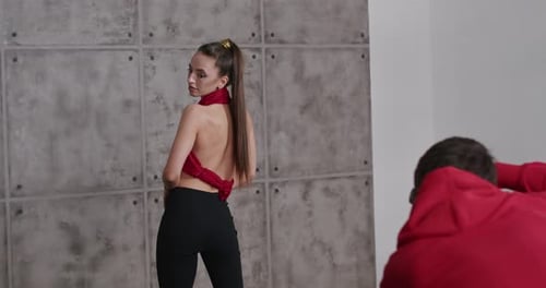 Happy Guy Photographer Professional Shoots Model in Studio Behind the Scenes