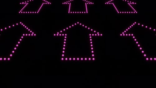 Animação colorida de setas brilhantes de néon no chão