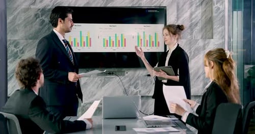 Business People at a Conference Table Presentation