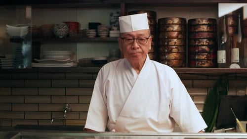 Senior Sushi Chef in Restaurant Kitchen Close Up