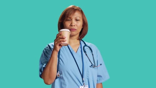 Nurse Tasting Instant Coffee at Work