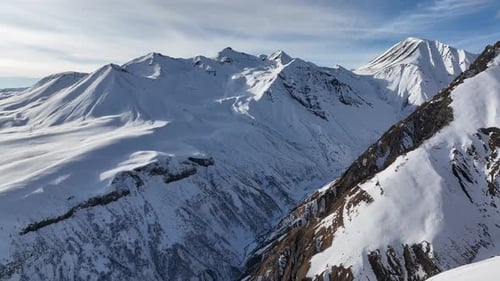 Aerial view of beautiful snowy mountains in Gudauri, Georgia