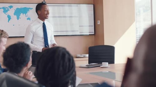 Black businessman, speaker or office boardroom presentation in global financial growth