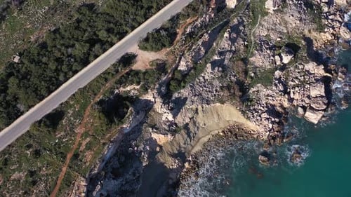 Aerial view of coastline and road, Malta.