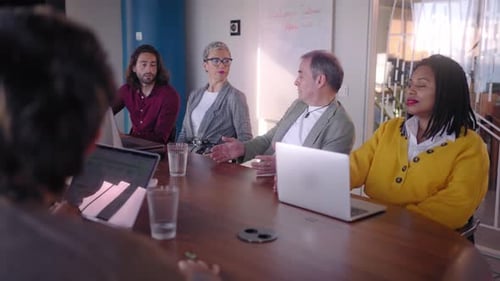 Team of Professional Business People Meeting in the Office Conference Room Modern Workplace