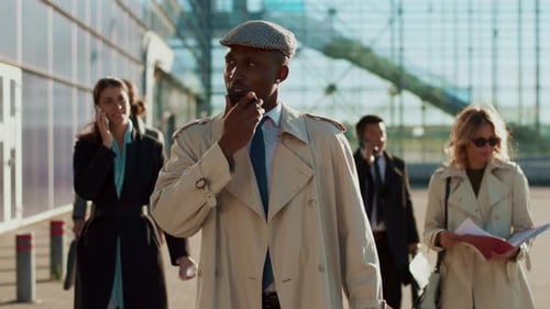 Diverse Business Team Confidently Walking to Work