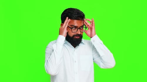 Man Massaging Temples, Headache, Against Green Screen