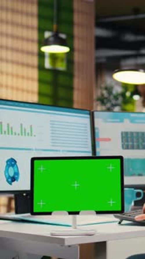 Vertical Video Professional Male Analyst Examining KPI Insights with Mockup on Tablet
