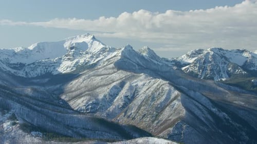 The Snowcapped Peaks, Steep Cliffs and Dense Forests of the Absaroka Mountain