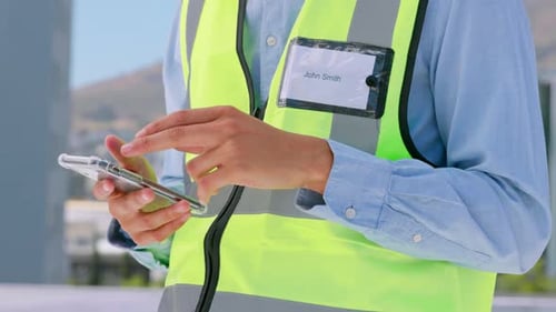 Phone, engineering or hands typing in city on construction site planning real estate building