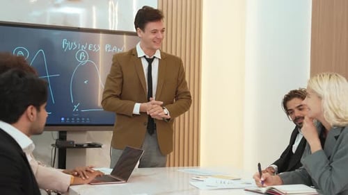 Business People Discussing Strategy at a Meeting