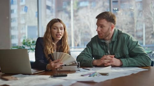 Interior Designer Planning Project with Man Client in Creative Agency Closeup